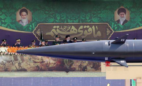 epaselect epa10876301 Iranian President Ebrahim Raisi attends the annual military parade marking the Iraqi invasion in 1980, which led to an eight-year-long war (1980-1988), in Tehran, Iran, 22 September 2023.  EPA/ABEDIN TAHERKENAREH