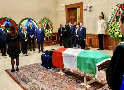 epa10880199 A handout picture made available by the Chigi Palace (Palazzo Chigi) Press Office shows Italian Premier Giorgia Meloni (3-L) paying respect at the coffin of late President Emeritus of the Republic Giorgio Napolitano laid in state in the Senate in Rome, Italy, 24 September 2023. Former Italian president Giorgio Napolitano died in a Rome clinic on...