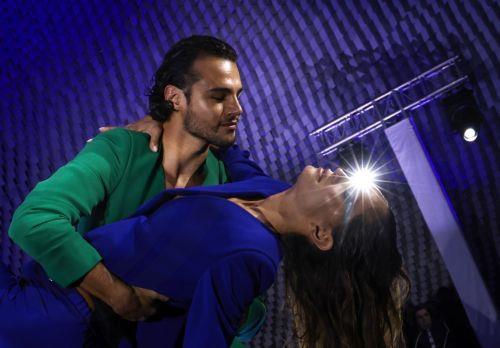 epa10883179 Models dance as they present creations of the Spring/Summer 2024 Womenswear collection by French label Pierre Cardin during the Paris Fashion Week, in Paris, France, 25 September 2023. The presentation of the Women's Rear-To-Wear collections runs from 25 September to 03 October 2023.  EPA/Mohammed Badra