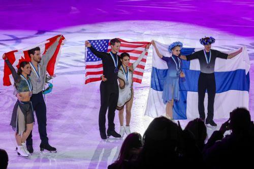 epa10983280 Second placed Laurence Fournier Beaudry (L) and Nikolaj Soerensen (2L) of Canada, first placed Madison Chock (3R) and Evan Bates (3L) of USA, and third placed Juulia Turkkila (2R) and Matthias Versluis (R) of Finland celebrate during the Ice Dance Victory Ceremony of the ISU Grand Prix Espoo 2023 in Espoo, Finland, 18 November 2023.  EPA/MAURI...