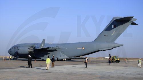 epa11004662 A Qatar Air Force aircraft is seen on the tarmac as it delivers winter aid for earthquake victims, in Herat, Afghanistan, 30 November 2023. The Qatari government sent 70 tons of aid to Herat, Afghanistan to support earthquake victims. The first shipment included food, health kits, blankets, and dates, with two additional planes expected to...