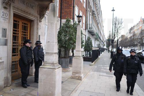 epa11107952 Police guard the London Clinic private hospital in London, Britain, 27 January 2024. Britain's King Charles III was scheduled for treatment for an enlarged prostate, after being admitted to the hospital on the morning of 26 January. Queen Camilla said the King was 'doing well' and was expected to spend at least one night at the hospital. ...