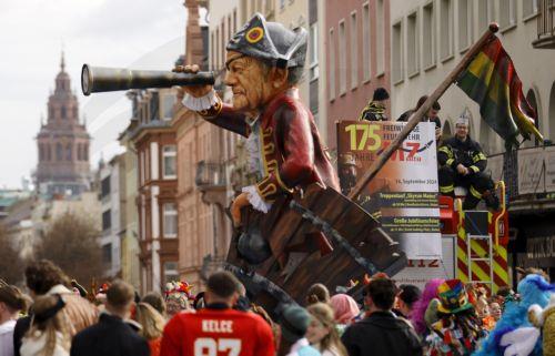 epa11147409 A carnival float depicting German Chancellor Olaf Scholz is seen during the Rose Monday carnival parade in Mainz, Germany, 12 February 2024. Mainz is one of the carnival strongholds in Germany with its Rose Monday parade jokingly criticising political and social developments. Rose Monday is the traditional highlight of the carnival season in...