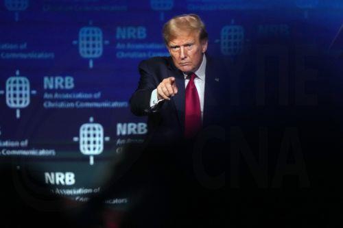 epaselect epa11173998 Former President Donald J. Trump points to the crowd after speaking at the 2024 National Religious Broadcasters International Christian Media Convention in Nashville, Tennessee, USA, 22 February 2024.  EPA/MARK HUMPHREY
