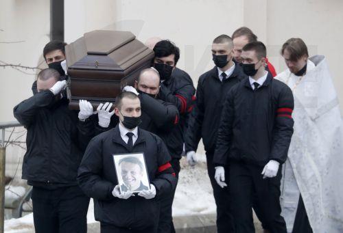 epa11190751 Funeral service workers carry out the coffin of late Russian opposition leader Alexei Navalny outside the Church of the Icon of the Mother of God, during his funeral in Moscow, Russia, 01 March 2024. Outspoken Kremlin critic Navalny died aged 47 in an arctic penal colony on 16 February 2024 after being transferred there in 2023. The colony is...