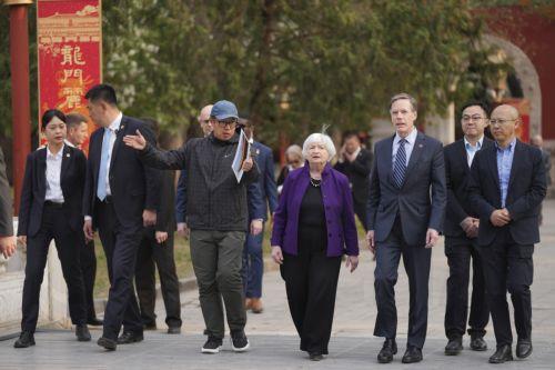 epa11265150 US Treasury Secretary Janet Yellen (C) and US ambassador to China Nicholas Burns (C-R) visit the Guozijian Imperial College site in Beijing, China, 08 April 2024. Secretary Yellen is on a six-day visit to China.  EPA/TATAN SYUFLANA / POOL