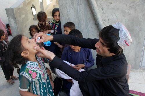 epa11307893 Children receive polio vaccines during a campaign in Kandahar, Afghanistan, 29 April 2024. The Ministry of Public Health in Afghanistan has launched a polio vaccination campaign aiming to vaccinate over 10 million children under five years old. Despite a recent 500 million US dollar contribution from Saudi Arabia towards global eradication...