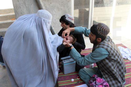 epa11307901 A child receives polio vaccine during a campaign in Kandahar, Afghanistan, 29 April 2024. The Ministry of Public Health in Afghanistan has launched a polio vaccination campaign aiming to vaccinate over 10 million children under five years old. Despite a recent 500 million US dollar contribution from Saudi Arabia towards global eradication...