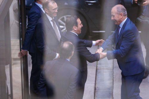 epa11372874 Spanish Foreign Minister Jose Manuel Albares (C) welcomes Irish Foreign Minister Michael Martin (R) and Norway's Foreign Minister Espen Barth Eide (L) before a press conference on the recognition of Palestinian statehood, at the Spanish representation office in Brussels, Belgium, 27 May 2024. On 22 May, Spain, Norway, and Ireland jointly...