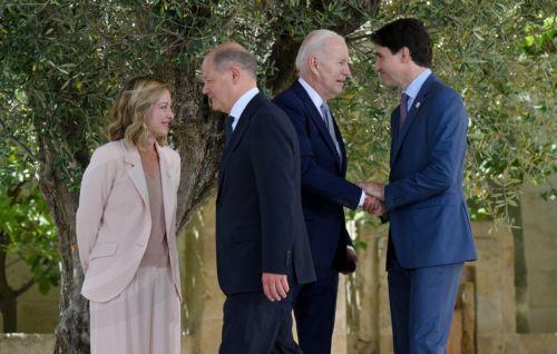 epa11407702 Italy's Prime Minister Giorgia Meloni (L) stands beside German Chancellor Olaf Scholz (C-L), US President Joe Biden (C-R) and Canadian Prime Minister Justin Trudeau (R) at the end of a welcome ceremony for the G7 summit in Borgo Egnazia, southern Italy, 13 June 2024. The 50th G7 summit will bring together the Group of Seven member states leaders...