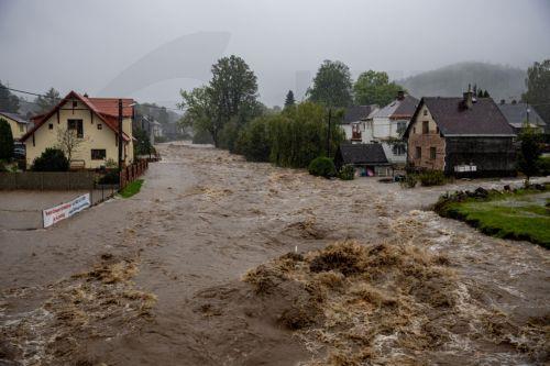 epa11605272 A general view of the overflowing of the Staric River following the heavy rain that hit the village of Lipova-Lazne, Czech Republic, 15 September 2024. Floods caused by heavy rains have been battering central and eastern Europe since 13 September, with at least four dead in Romania, four missing in the Czech Republic, and alarming water levels...