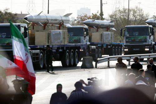 epa11616806 Trucks carry Iranian long-range missiles Kheibar Shekan during the annual military parade marking the Iraqi invasion in 1980, which led to an eight-year-long war (1980-1988); in Tehran, Iran, 21 September 2024. According to IRNA newes agency, Iranian president Masoud Pezeshkian said 'our defense system power is on that level that no enemy even...