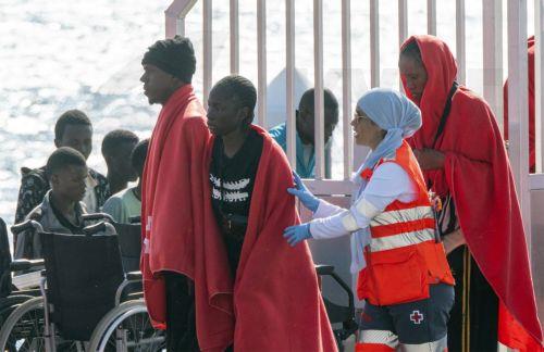 epa11620576 Sub-Saharan immigrants arrive at Arrecife harbor in Lanzarote, the Canary Islands, Spain, 23 September 2024. Search and Rescue Ship 'Salvamar Al Nair' rescued forty-five Sub-Saharan immigrants as they were trying to reach Lanzarote island on board an inflatable boat.  EPA/ADRIEL PERDOMO