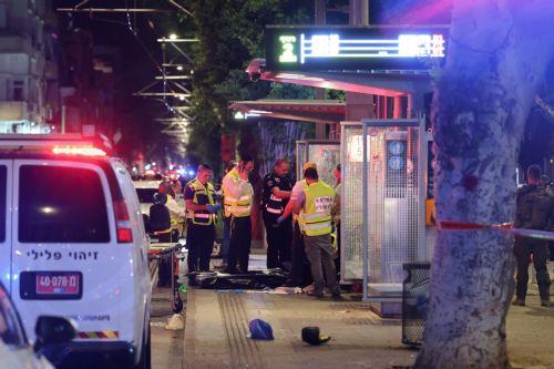 epaselect epa11636325 Israeli forensic officers inspect the site of a shooting incident in Tel Aviv, Israel, 01 October 2024. According to Israeli police, at least eight people were killed and nine others wounded in a shooting incident on Sderot Yerushalim in Tel Aviv. Two gunmen have been 'neutralized' on site, police said.  EPA/ABIR SULTAN