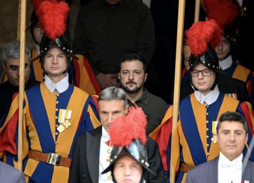 epa11654292 Ukrainian President Volodymyr Zelensky (C), flanked by Swiss Guards, leaves after a private audience with Pope Francis (not pictured) at the San Damaso courtyard in the Vatican City, 11 October 2024. Zelensky is visiting the Vatican for the third time after holding talks with the pontiff in 2020 and 2023.  EPA/ETTORE FERRARI