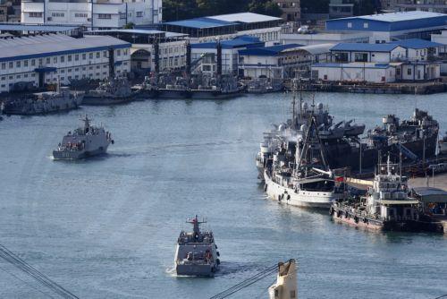 epa11657964 Taiwan Navy Kuang Hua VI-class missile boats maneuver at the Keelung military harbor in Keelung city, Taiwan, 14 October 2024. Chinese People's Liberation Army (PLA) announced on 14 October 2024 to conduct â€˜Joint Sword-2024Bâ€™ drills around Taiwan.  EPA/RITCHIE B. TONGO