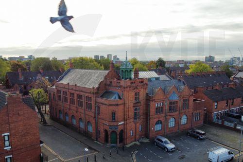 epa11658013 An aerial photograph taken by drone of the Salford Lads Club in Salford, Britain, 14 October 2024. The club, which was opened in 1903 to provide recreation and sport for boys, is threatened with closure due to the rising costs of delivering youth programmes and maintaining its grade II listed building. The club gained international fame when...