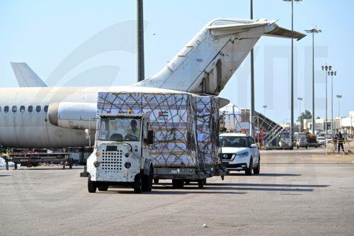 epa11658022 Workers unload relief supplies provided by the United Arab Emirates at Beirut airport, in Beirut, Lebanon, 14 October 2024. The United Arab Emirates launched the nationwide campaign 'UAE Stands with Lebanon' running from 13 to 21 October to gather supplies for the people of Lebanon. According to the Lebanese Ministry of Health, more than 2,300...