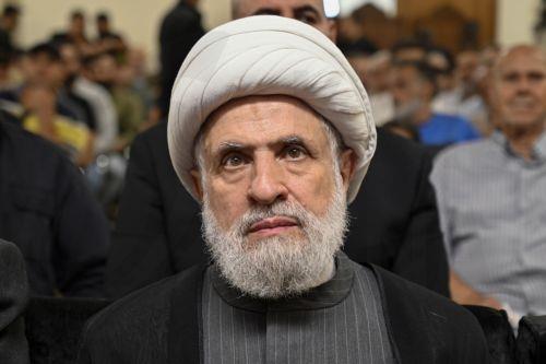 epaselect epa11689987 (FILE) - Hezbollah deputy leader Sheikh Naim Qassem listens to a speech of Hezbollah leader Hassan Nasrallah (not pictured) via a screen at a memorial ceremony for senior Hezbollah commander, in a suburb outside Beirut, Lebanon, 19 June 2024 (reissued 29 October 2024). Lebanon's Hezbollah on 29 October announced that its deputy leader...