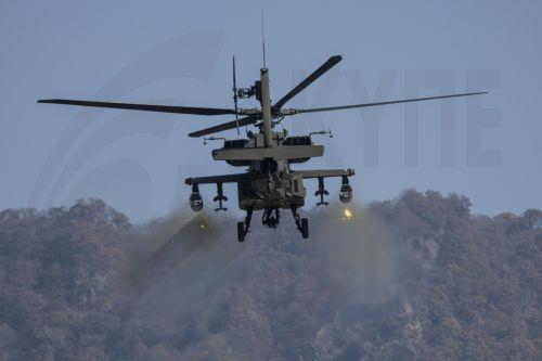 epa11691791 An AH-64E Apache attack helicopter fires missiles during a joint South Korea-US live-fire exercise in Pocheon, north of Seoul, 30 October 2024.  EPA/YONHAP SOUTH KOREA OUT