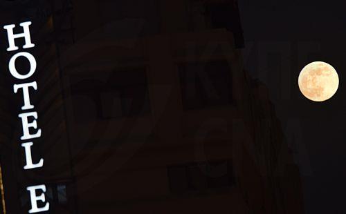 epa11723057 The Super Full Moon also called 'The Sturgeon' rises in the sky in Karachi, Pakistan, 15 November 2024. The super full moon is named thus because it is at its closest to earth and this appears bigger than a normal full moon. There are generally two to four supermoons per year, depending on the moon's closeness to earth.  EPA/SHAHZAIB AKBER