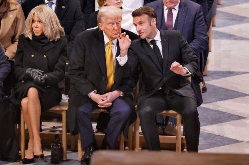 epa11763615 French President Emmanuel Macron (R) and US president-elect Donald J. Trump (C) talk during a ceremony marking the official reopening of the Notre Dame de Paris cathedral, in Paris, France, 07 December 2024. The Notre Dame de Paris Cathedral reopens on 07 December after nearly six years of renovation work following its destruction by a fire on...
