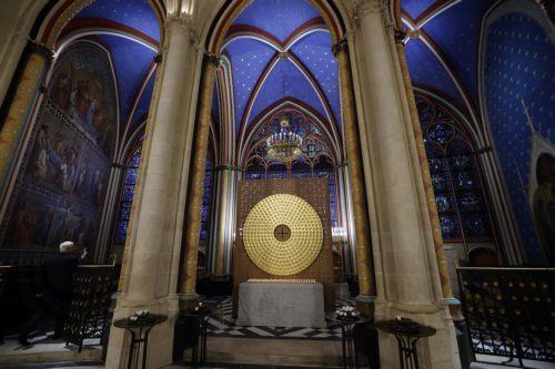 epa11763705 The Crown of Thorns designed by French artist Sylvain Dubuisson is displayed inside Notre-Dame Cathedral during a ceremony marking the official reopening of the Notre Dame de Paris cathedral, in Paris, France, 07 December 2024. The Notre Dame de Paris Cathedral reopens on 07 December after nearly six years of renovation work following its...