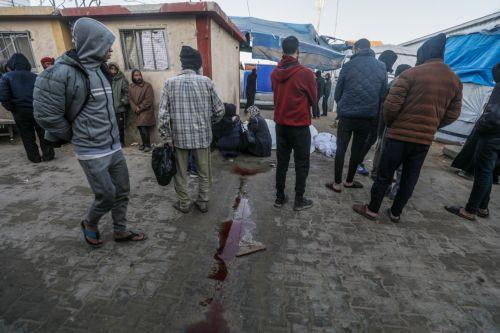 epa11803180 Palestinians attend the funerals of their relatives killed in Israeli air strikes, in Al Aqsa Martyrs Hospital, in Deir Al Balah, central Gaza Strip, 03 January 2025. According to reports from the Ministry of Health in Gaza, more than 29 people were killed following Israeli air strikes in the refugee camps of central Gaza Strip. More than 45,500...