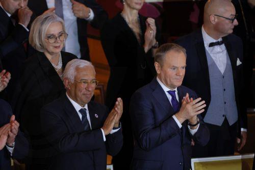 epa11804451 European Council President Antonio Costa (L) and Polish Prime Minister Donald Tusk (R) attend official inauguration of Poland's six-month rotating presidency of Council of the European Union at the Teatr Wielki - Polish National Opera in Warsaw, Poland, 03 January 2025. Poland officially took over the six-month rotating presidency of the Council...