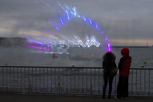 epaselect epa11828974 People observe a new project titled "Rade Radiance" by SBK Laser shown as part of the Geneva Lux Festival in Geneva, Switzerland, 16 January 2025. Geneva Lux festival at its 11th edition is a contemporary light show consisting of 24 light and decoration projects, created and scripted by Swiss and international artists, running from 17...