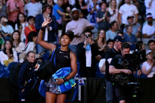epa11830051 Naomi Osaka of Japan waves to the crowd as she retires during her round three match against Belinda Bencic of Switzerland for the 2025 Australian Open at Melbourne Park in Melbourne, Australia, 17 January 2025.  EPA/JAMES ROSS AUSTRALIA AND NEW ZEALAND OUT