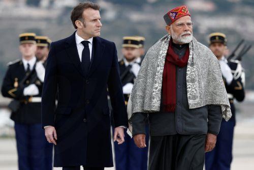 epa11890597 French President Emmanuel Macron and Indian Prime Minister Narendra Modi attend a departure ceremony at Marseille Provence airport in Marignane as part of a visit in Marseille, France, 12 February 2025.  EPA/CHRISTIAN HARTMANN / POOL MAXPPP OUT