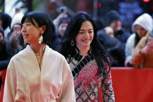 epa11895901 Executive producer Yao Chen (R) and Zhang Fan attend the red carpet for 'Sheng Xi Zhi Di (Living The Land)' during the 75th Berlin International Film Festival, in Berlin, Germany, 14 February 2025. The Berlinale runs from 13 to 23 February 2025.  EPA/HANNIBAL HANSCHKE