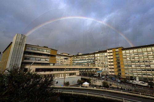 epaselect epa11905523 A rainbow over the Gemelli Hospital where Pope Francis is hospitalized for tests and treatment for bronchitis, in Rome, Italy, 18 February 2025. Pope Francis was hospitalized on 14 February due to a respiratory tract infection. While his condition is showing signs of improvement, the hospitalized pontiff will not lead his weekly...