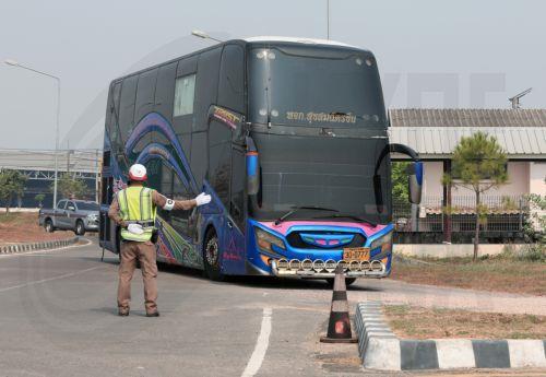 epa11909003 A bus carrying Chinese victims who have been rescued from illegal call center scammer operations in Myanmar arrives during a repatriation at the Mae Sot Airport on the Thai-Myanmar border in Mae Sot district, Tak province, Thailand, 20 February 2025. About 200 Chinese nationals were flown back to China after being rescued from call scam centers...