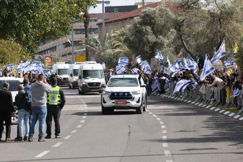 epa11909564 A convoy carrying the bodies of four Israeli hostages handed over by Hamas arrives at the National Center of Forensic Medicine in Tel Aviv, Israel, 20 February 2025. Hamas handed over the bodies of four Israeli captives, including that of youngest hostage Kfir Bibas, as part of the ongoing Gaza ceasefire deal. Hamas said in November 2023 that...