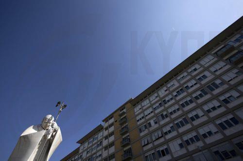 epa11947148 The statue of Pope John Paul II outside the Gemelli University Hospital, where Pope Francis is hospitalized, in Rome, Italy, 07 March 2025. The pontiff was admitted to Rome's Gemelli Hospital on 14 February, due to a respiratory tract infection.  EPA/MASSIMO PERCOSSI