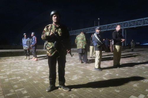 epa11957458 Pakistani security officials stand guard after passengers rescued from the Peshawar bound Jaffar express train that was attacked by suspected militants in Sibi, reached a railway station in Quetta, the provincial capital of restive Balochistan province, Pakistan, 12 March 2025. At least 80 passengers were rescued while approximately more than...