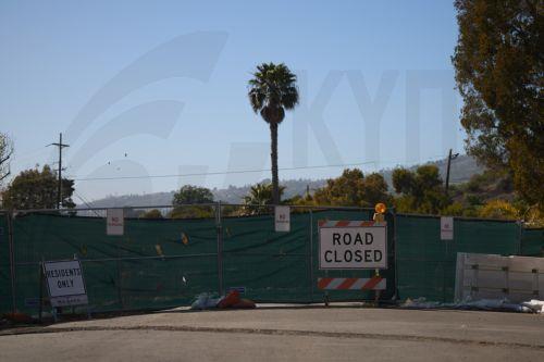 epa11984929 A road is closed amid land movement in Rancho Palos Verdes, California, USA, 23 March 2025. The Palos Verdes Peninsula has been seeing a decades-long, slow-moving landslide that is pulling apart structures, cutting gas and power lines, and severing roads. According to NASA, the large amount of rainfall from storms in 2023 and 2024 significantly...