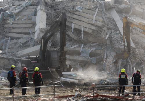 epa11996744 Rescue workers conduct a search operation for survivors at the site of a collapsed building, following an earthquake in Bangkok, Thailand, 29 March 2025. According to Suriyachai Rawiwan, Director of the Department of Disaster Prevention and Mitigation, at least seven fatalities have been confirmed, nine injured were taken to the hospital and at...