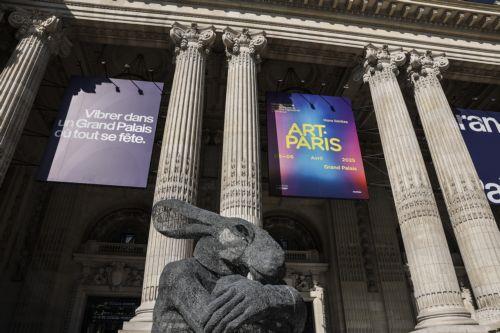 epa12004911 The entrance to the Art Paris fair at the Grand Palais in Paris, France, 02 April 2025. The modern and contemporary fair Art Paris runs from 03 to 06 April 2025 and hosts 170 galleries from 25 countries around the world.  EPA/TERESA SUAREZ