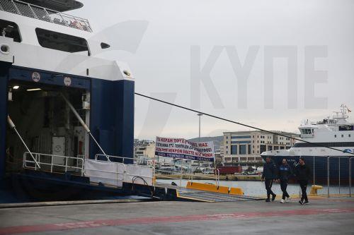 epa12019705 People walk next to docked ships during a 24-hour strike at the port of Piraeus, near Athens, Greece, 09 April 2025. Public transport staff unions stage a 24-hour walkout to coincide with a strike by the civil servants' union federation ADEDY. The strikes are expected to affect buses, trains, taxis, and the Athens metro. Ships scheduled to...