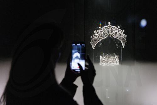 epa12019946 A member of the media films a Cartier scroll tiara and choker necklace, worn by Barbadian singer Rihanna at a fashion shoot for W magazine in 2016, during a photocall for V&A'S major exhibition 'Cartier' in London, Britain, 09 April 2025. The exhibition features more than 350 objects and explores French jewellery house's legacy of art, design...