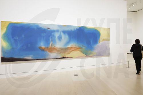 epa12022147 People visit the exhibition 'Helen Frankenthaler: Painting Without Rules' at the Guggenheim Museum of Bilbao, Spain, 10 April 2025. The exhibition, running from 11 April to 28 September, gathers the work of Frankenthaler, best known for her invention of the soak-stain technique, which played a pivotal role in the transition from Abstract...