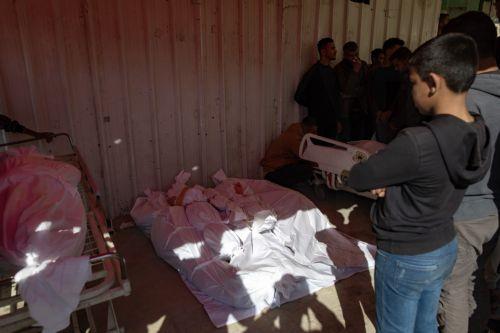 epa12038418 Palestinians react next to the bodies of their relatives from the Maqdad (Nasawi) family, who were killed in an Israeli airstrike, in Jabalia, northern Gaza Strip, 18 April 2025. More than 51,000 Palestinians have been killed in the Gaza Strip, according to the Palestinian Ministry of Health, since Israel launched a military campaign in the...