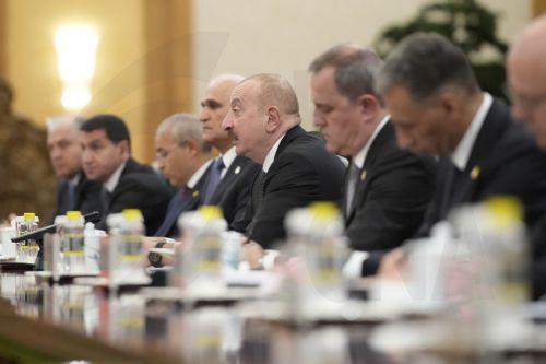 epa12048092 Azerbaijan President Ilham Aliyev(4-R) and Chinese President Xi Jinping (not pictured) attend a meeting at The Great Hall of The People in Beijing, China, 23 April 2025.  EPA/IORI SAGISAWA / POOL