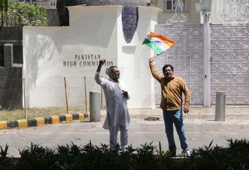 epa12050973 Protesters hold Indian flag and shout slogans during Anti-Terror Action Forum protest near the Pakistan High Commission in New Delhi, India, 24 April 2025. Protests have erupted near the Pakistan High Commission amid escalating tensions between Delhi and Islamabad following the deadly attack in the popular tourist destination of Pahalgam in...