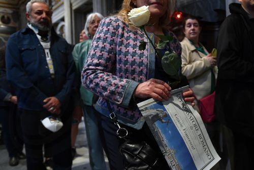 epa12057748 People queue to visit the tomb of Pope Francis at the Papal Basilica of Saint Mary Major in Rome, Italy, 27 April 2025. Pope Francis passed away on Easter Monday, 21 April 2025, at the age of 88.  EPA/FABIO CIMAGLIA