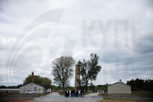 epa12072741 People visit the grounds of the former concentration camp Sachsenhausen during an event part of the commemorations for the 80th anniversary of the liberation of the camp, in Oranienburg near Berlin, Germany, 04 May 2025. The Sachsenhausen concentration camp was liberated on 22 April 1945. More than 200,000 people were imprisoned there between...