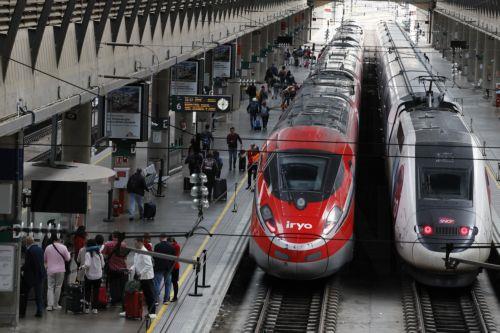 epa12074399 High-speed trains bound for Madrid at Santa Justa station in Seville, Spain, 05 May 2025, after the train connection between Seville and Madrid was interrupted the previous day due to the theft of cables at several points. According to Transport Minister Oscar Puente, the connection will be reestablished at 9.30 am local time on 05 May. ...